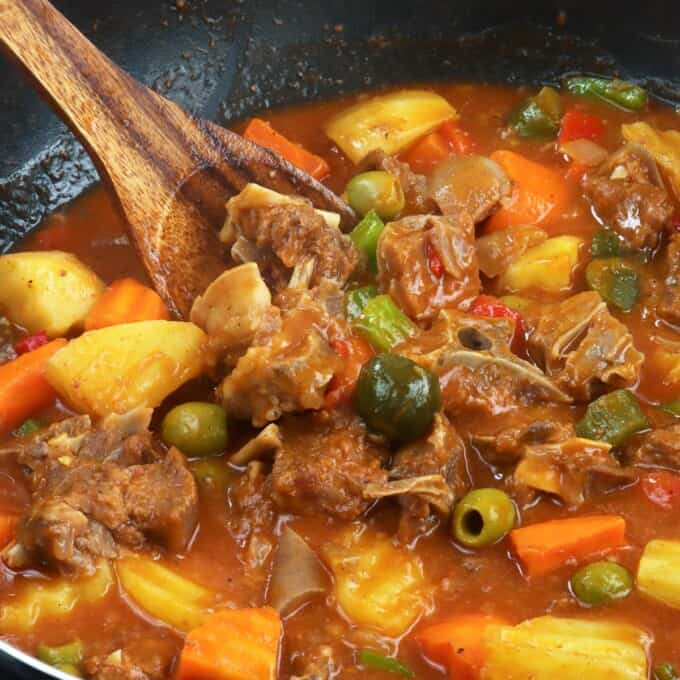 goat caldereta cooked in a pan