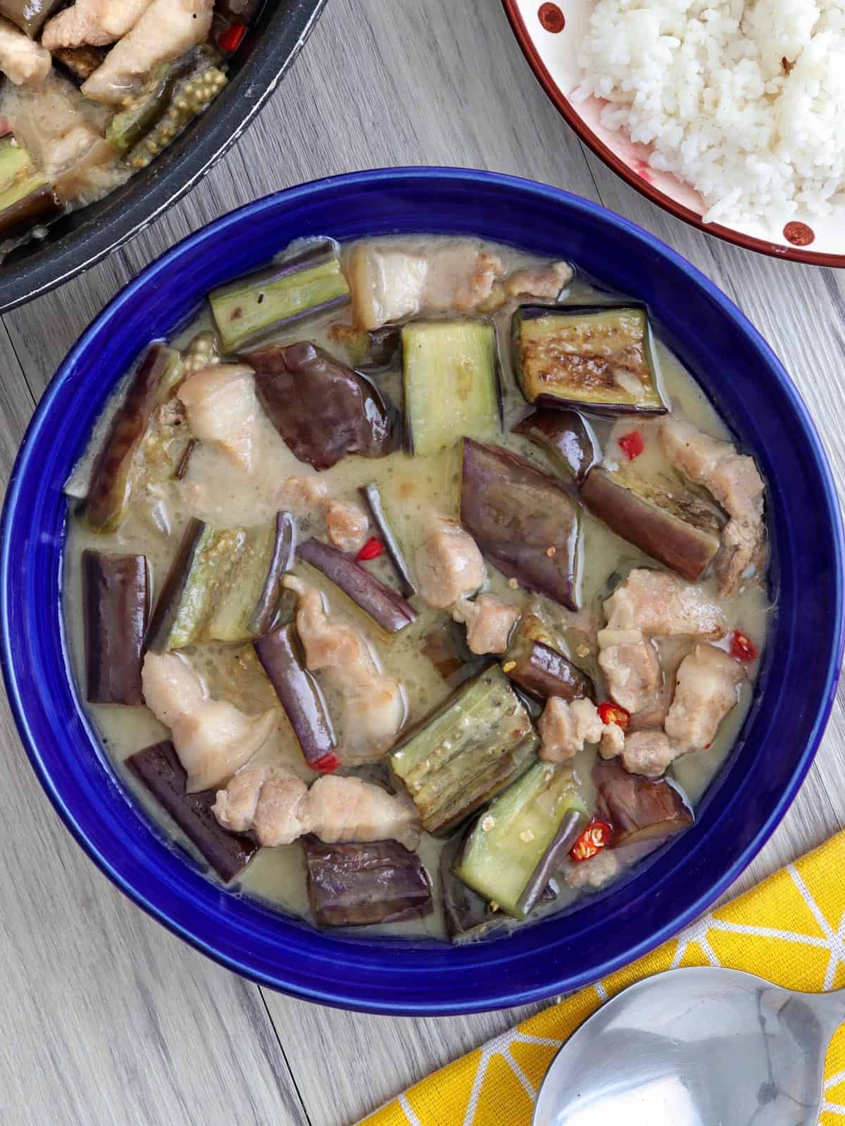 Ginataang Talong in a blue serving bowl