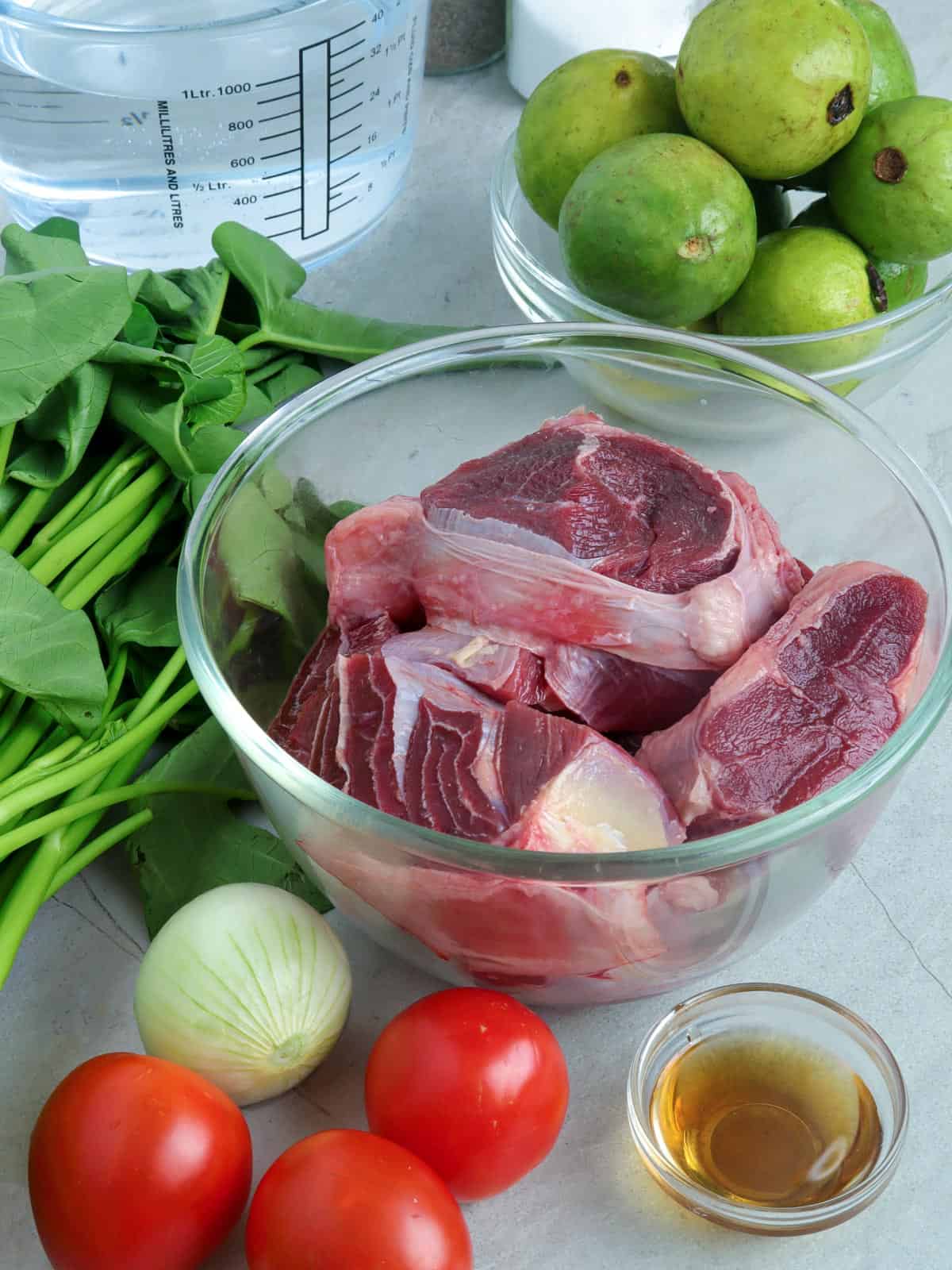 beef shanks, kangkong, guavas, onion, tomatoes, fish sauce, water