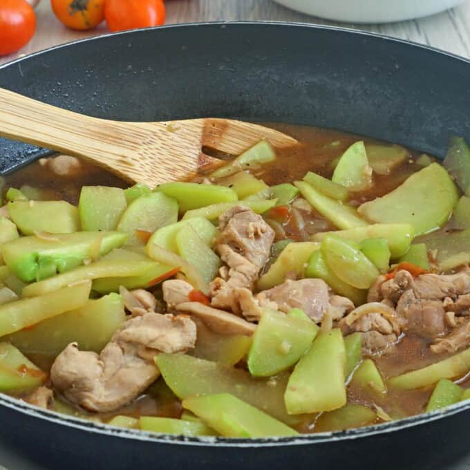 Ginisang Sayote with Chicken in a pan