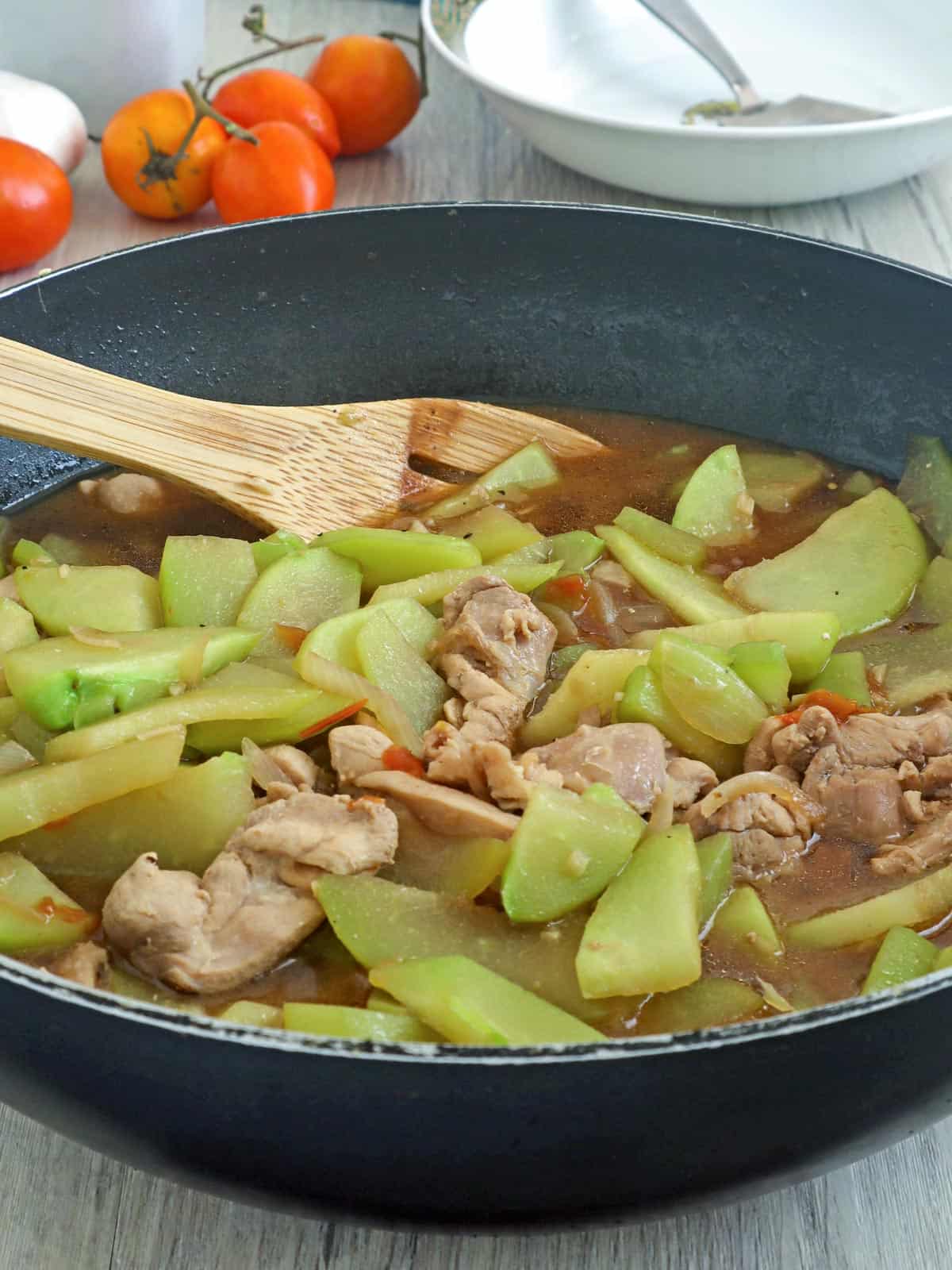 Ginisang Sayote with Chicken in a pan