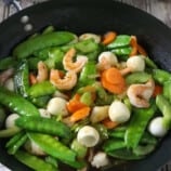 Snow Peas with Shrimp Stir Fry in a pan