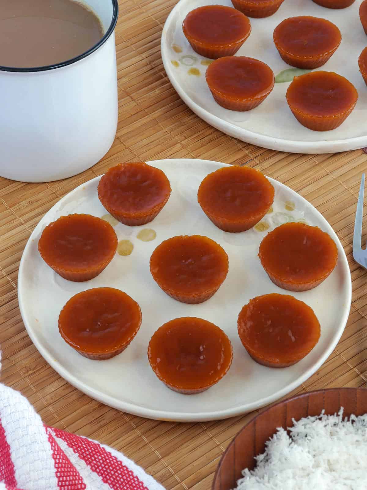 Cuchinta on a white plate with a cup of coffee in the background.