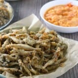 Crispy Fried Smelt Fish on a paper-lined bowl