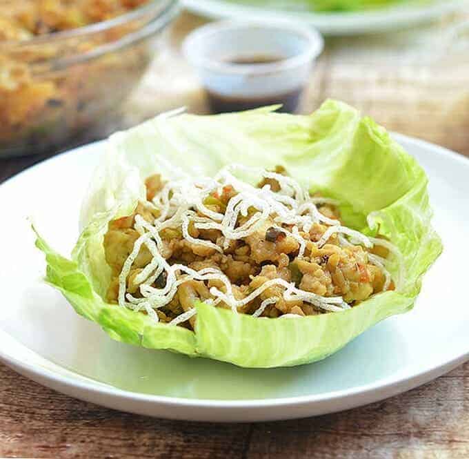These chicken lettuce cups are topped with crunchy vermicelli noodles.