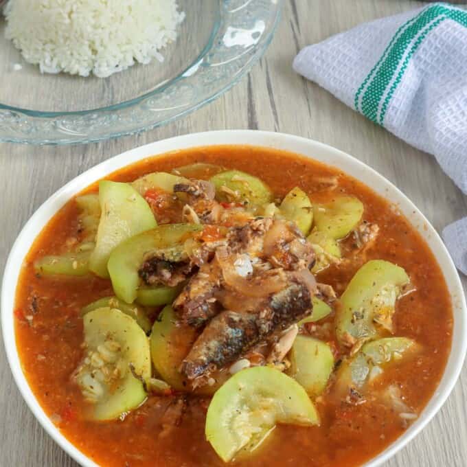 ginisang sardinas with upo in a white serving bowl