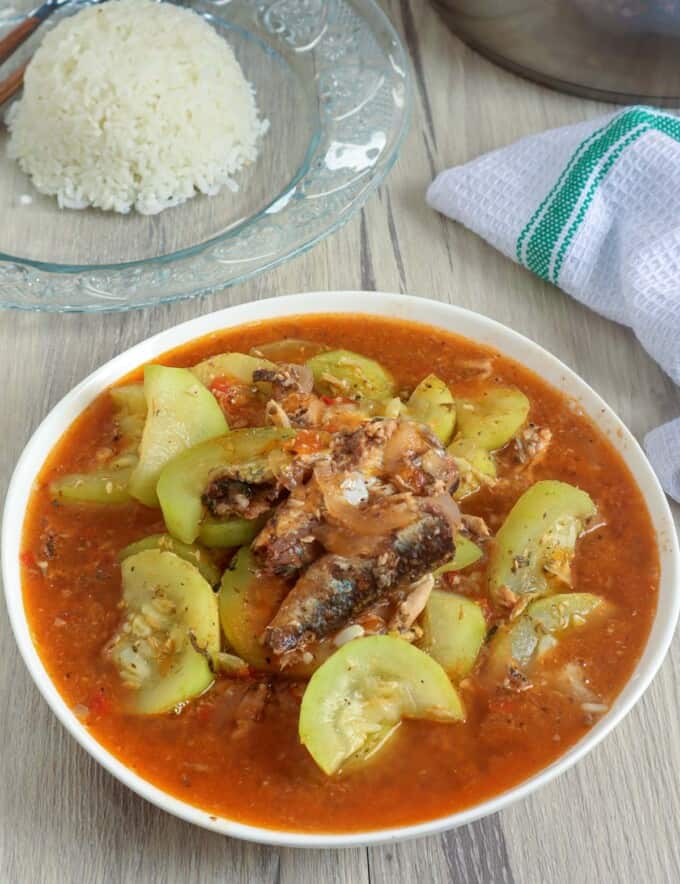 ginisang sardinas with upo in a white serving bowl