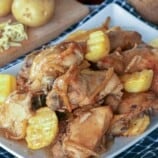 chicken and potato stew on a white serving platter