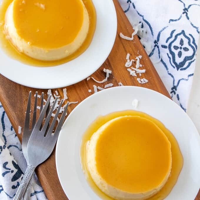 top view of coconut custard with caramel topping on a white plate