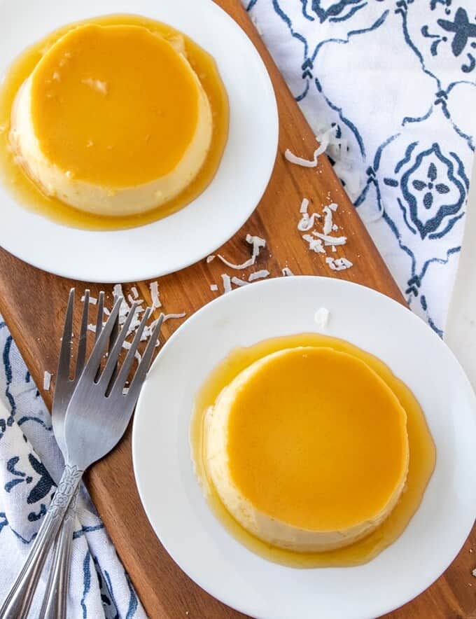 top view of coconut custard with caramel topping on a white plate