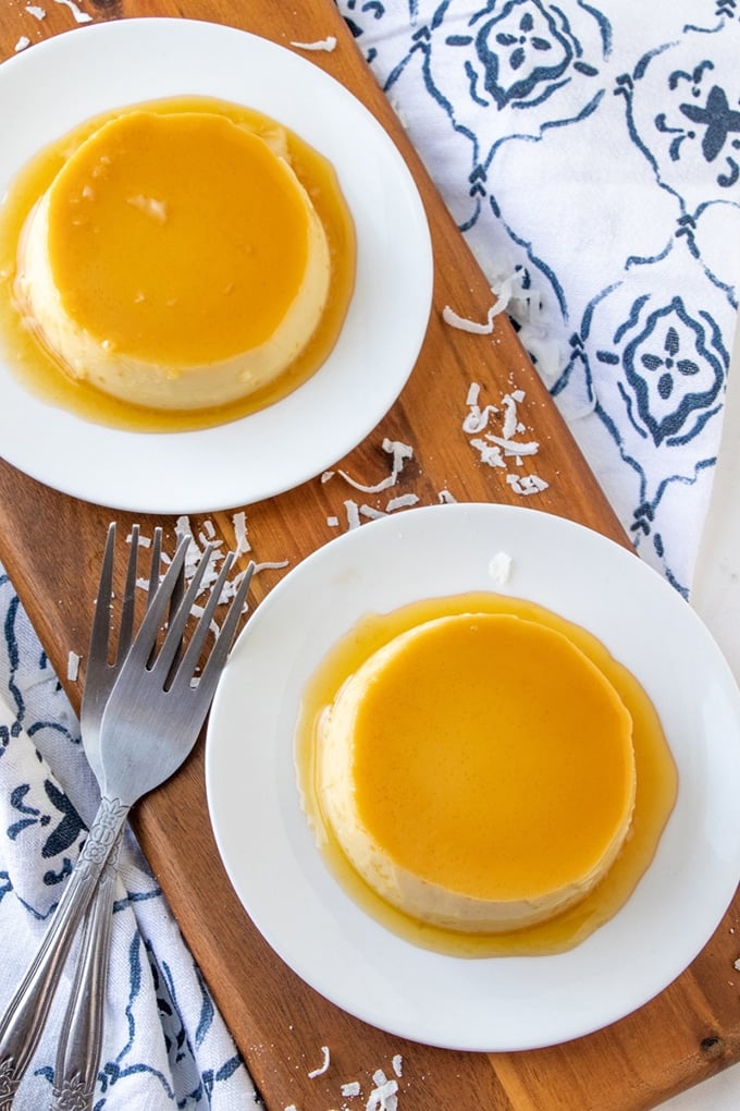 top view of coconut custard with caramel topping on a white plate