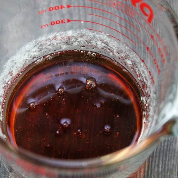 caramelized sugar in a glass measuring cup