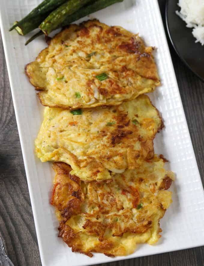 egg omelet with silverfish on a platter