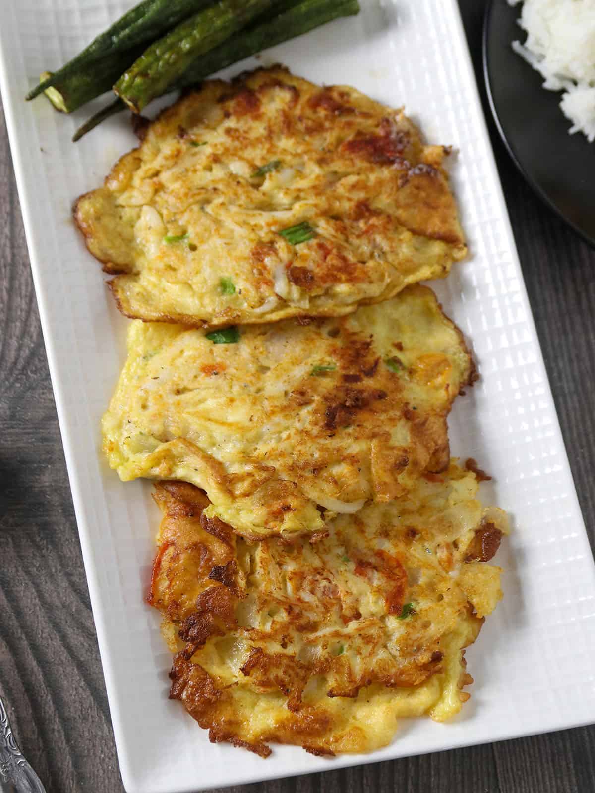 egg omelet with silverfish on a platter