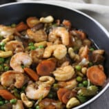 Shrimp with Green Peas and Cashews in a pan