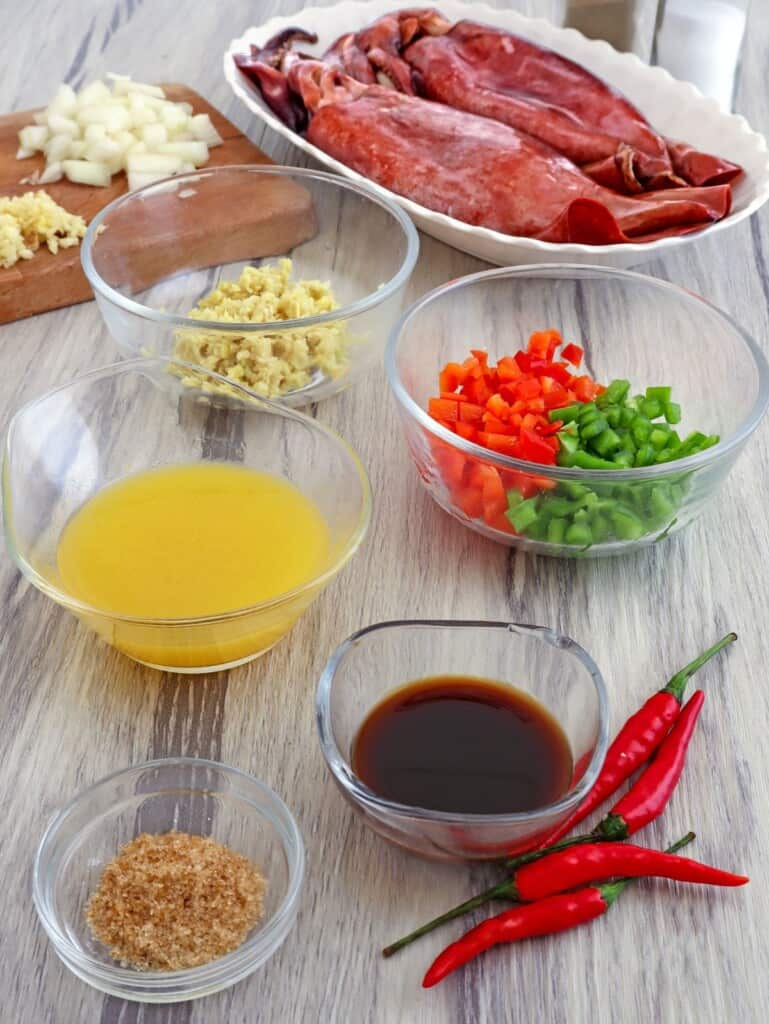 jumbo squid, calamansi juice, Worcestershire sauce, bell peppers, garlic, onions, ginger, chili peppers, brown sugar