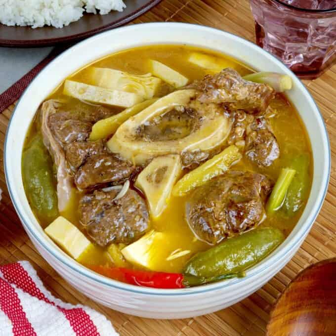 cansi soup in a white bowl