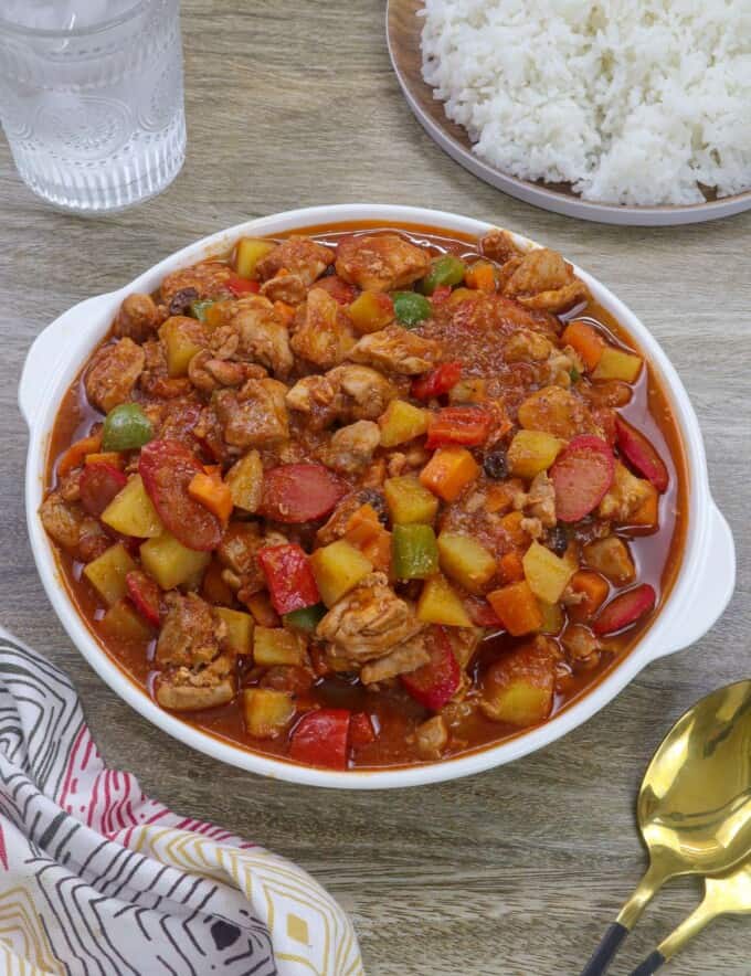 menudong manok in a white serving bowl.