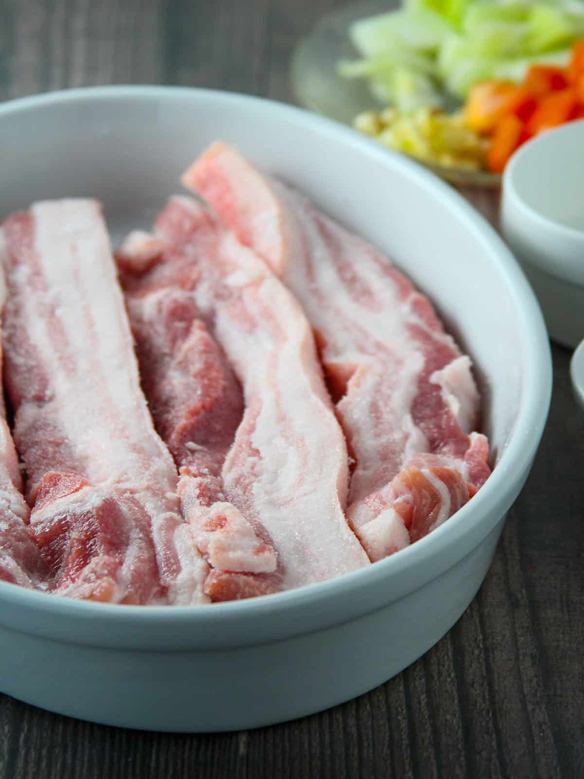 pork belly in a casserole dish