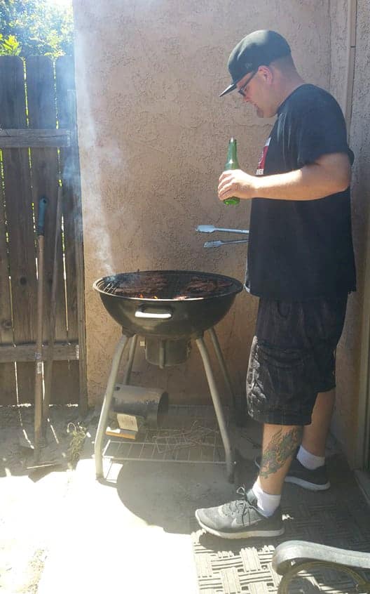 man grilling beef kalbi