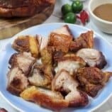 chopped crispy pork shoulder on a serving plate