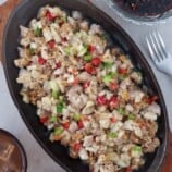 crispy sisig on a sizzling plate