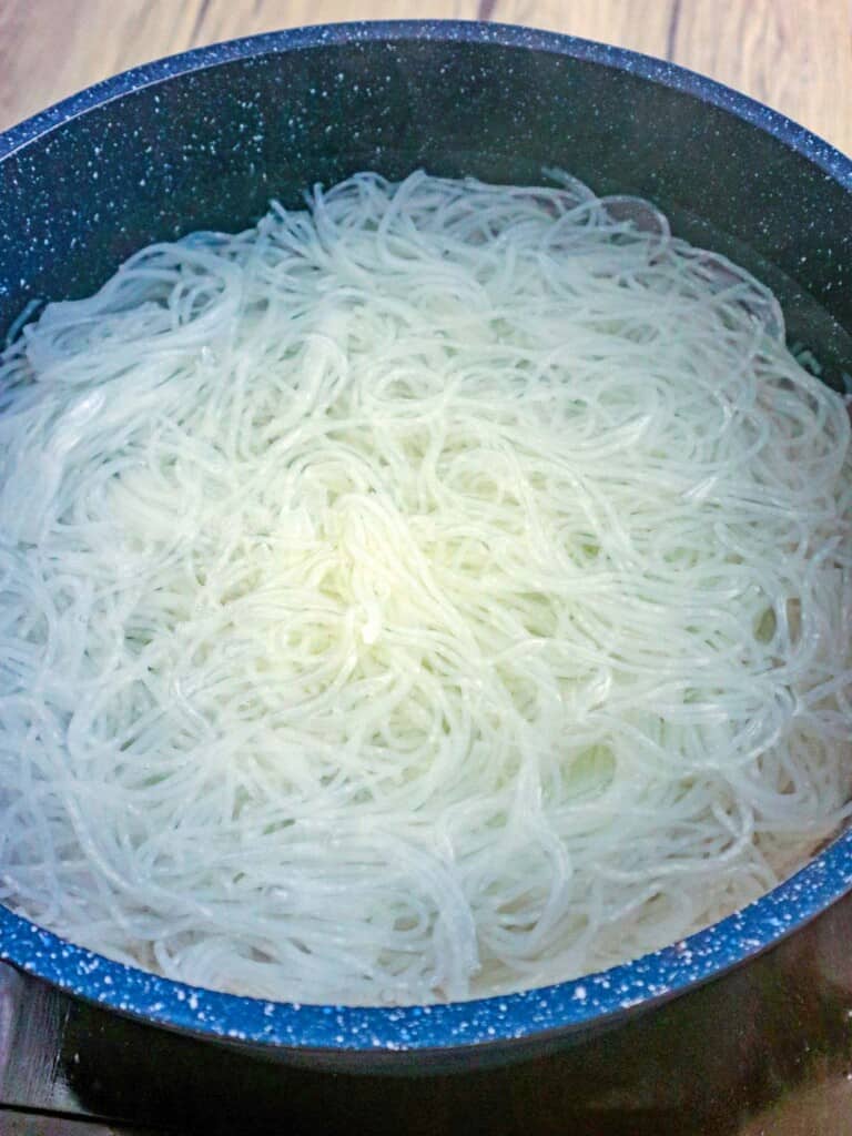 rice noodles cooked in a pot