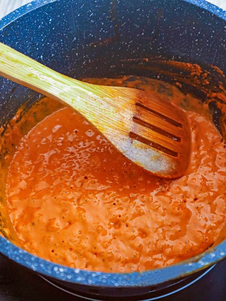 making shrimp gravy in a pot