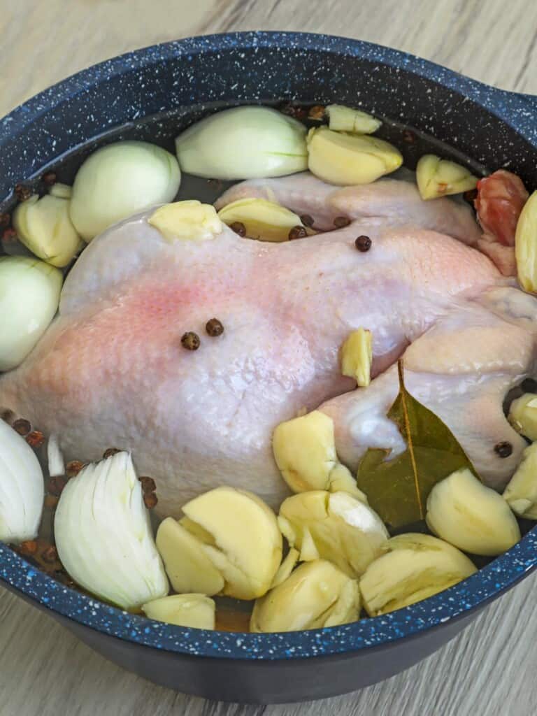 chicken submerged in brine