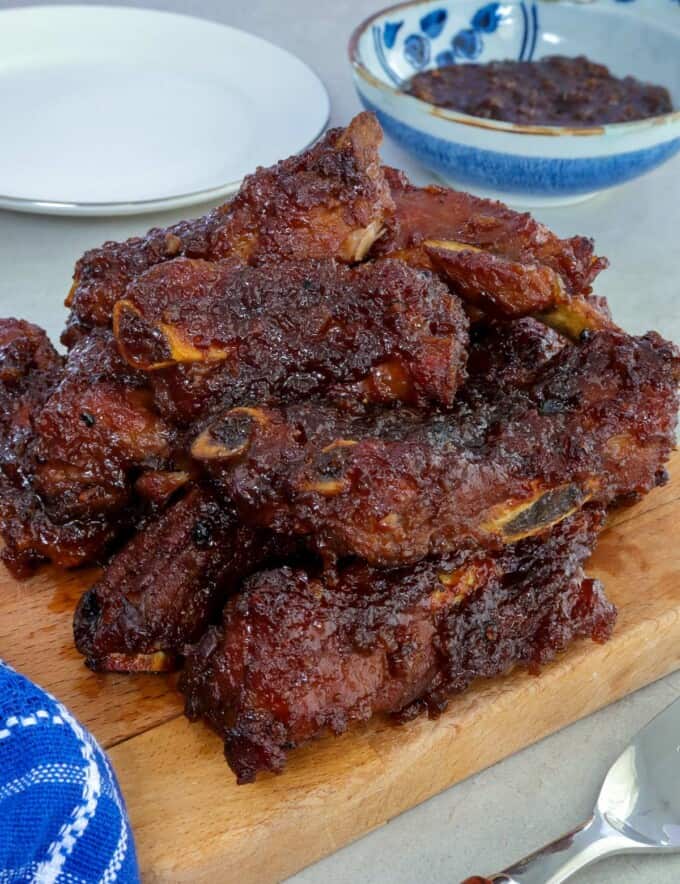 Baby Back Ribs with Adobo Glaze on a wooden board