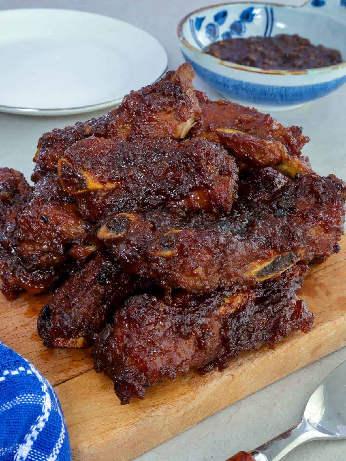 Baby Back Ribs with Adobo Glaze on a wooden board