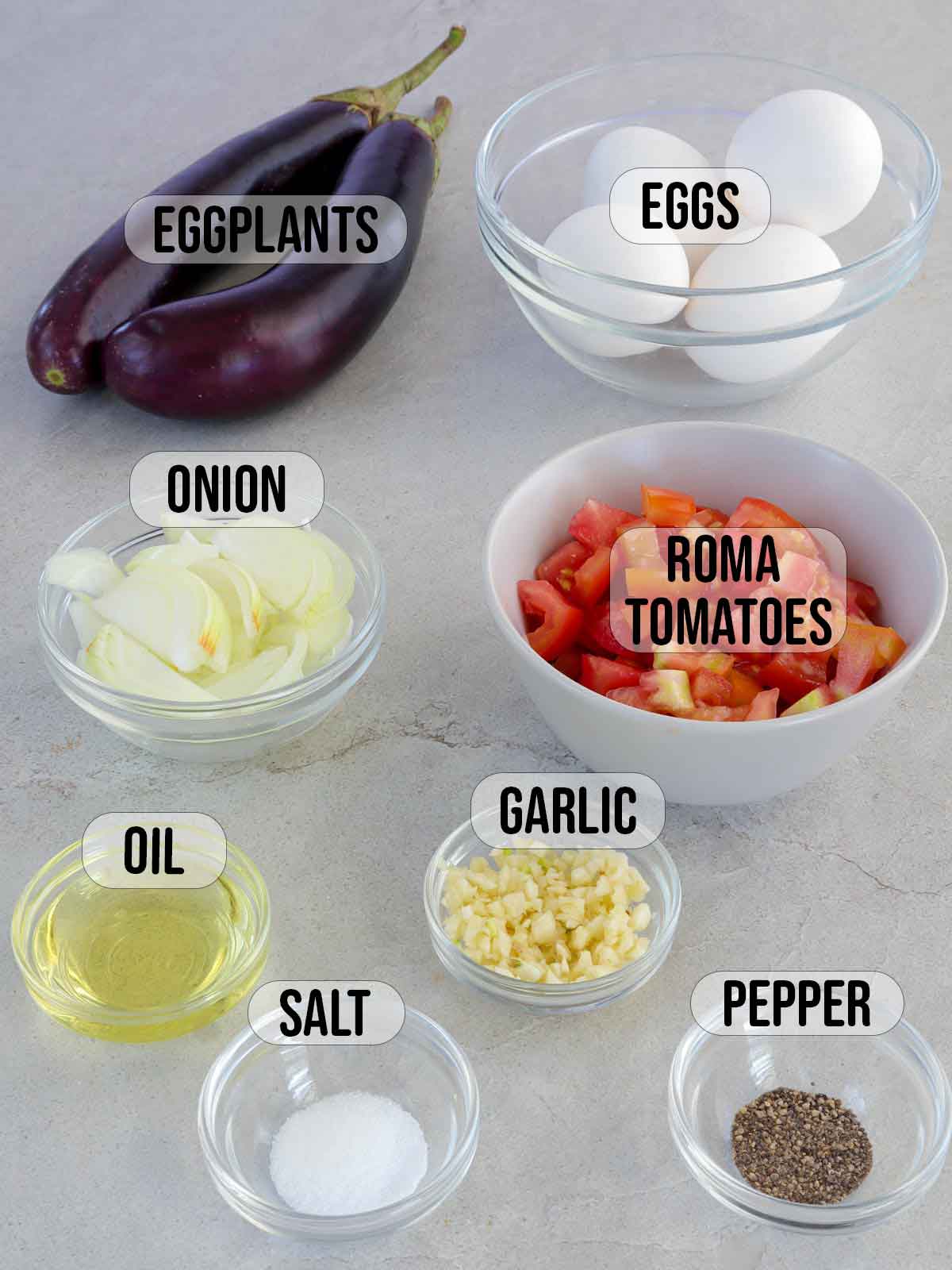 eggs, eggplant, chopped tomatoes, onions, garlic, oil, salt, and pepper.