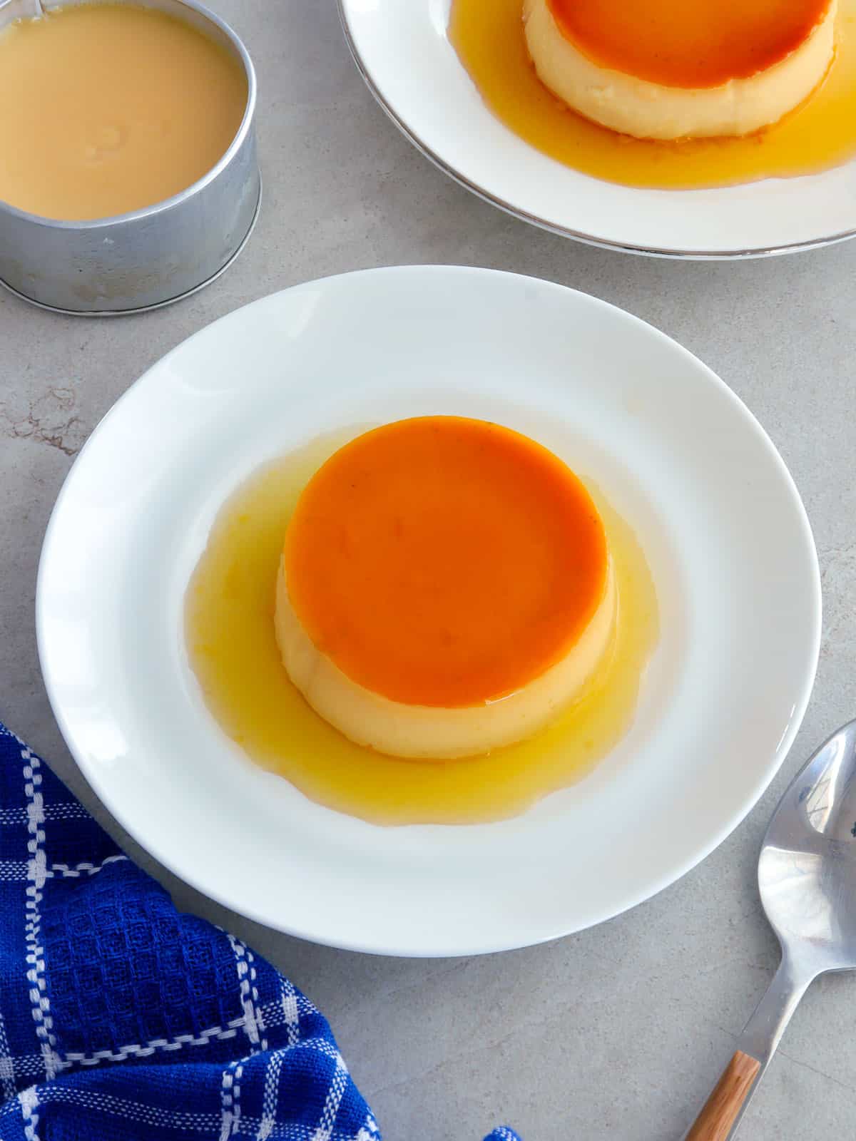 Leche Flan with Whole Eggs on a white plate