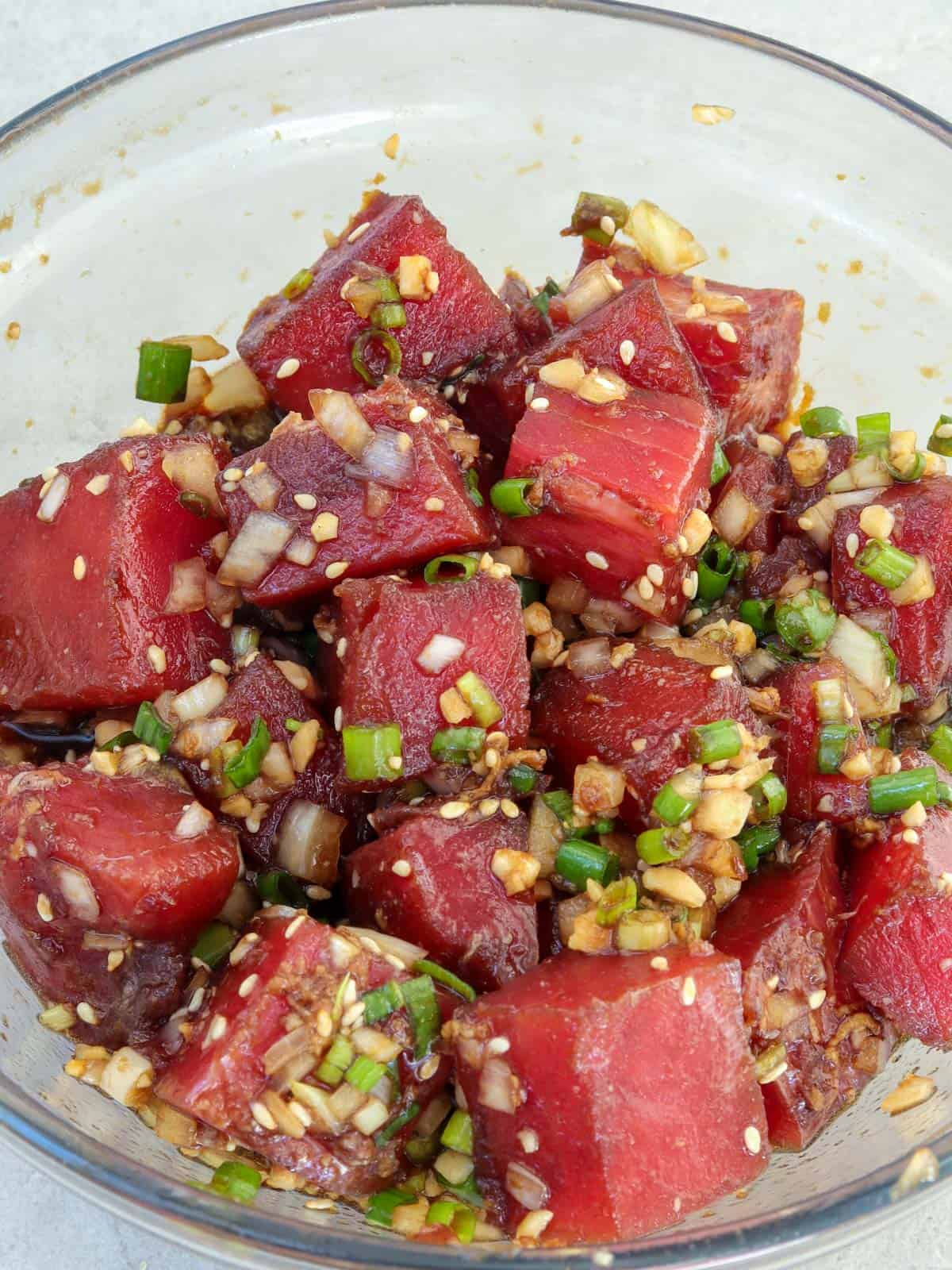 Ahi Shoyu Poke in a clear glass bowl