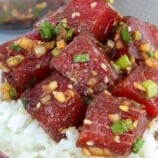 Ahi shoyu poke over sushi rice in a bowl