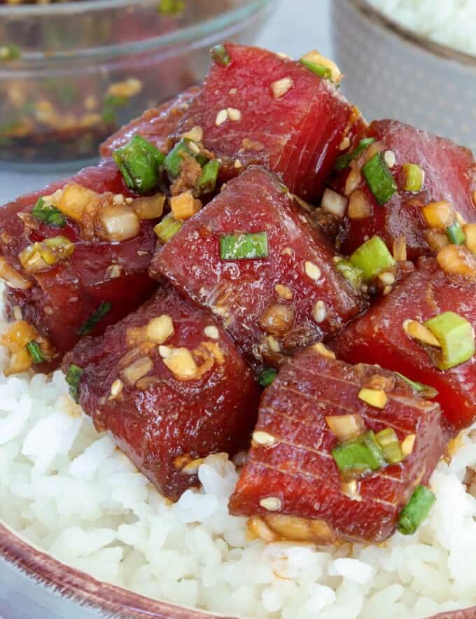 Ahi shoyu poke over sushi rice in a bowl