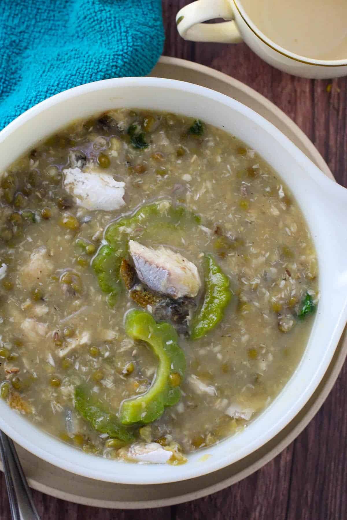 mung bean stew with smoked fish in a serving bowl