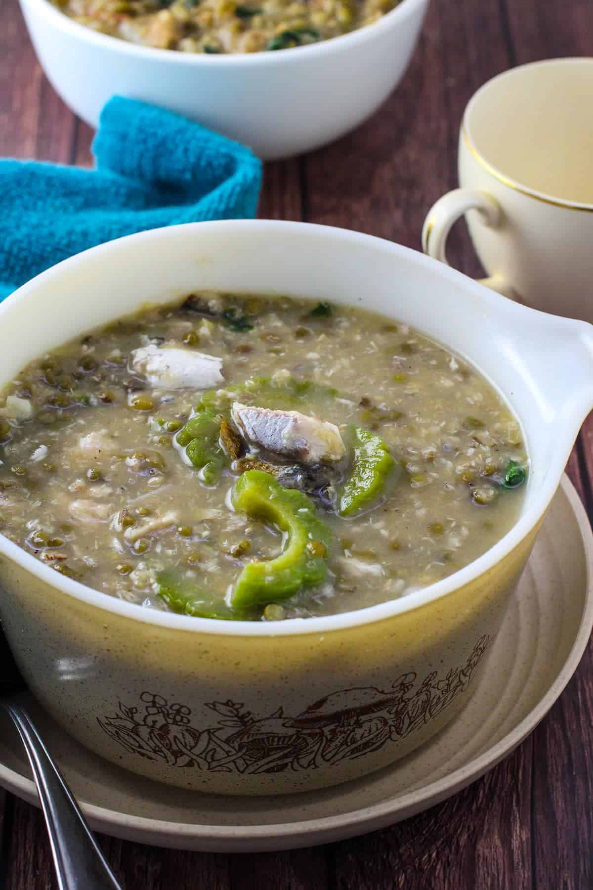 ginisang munggo at tinapa in a serving bowl