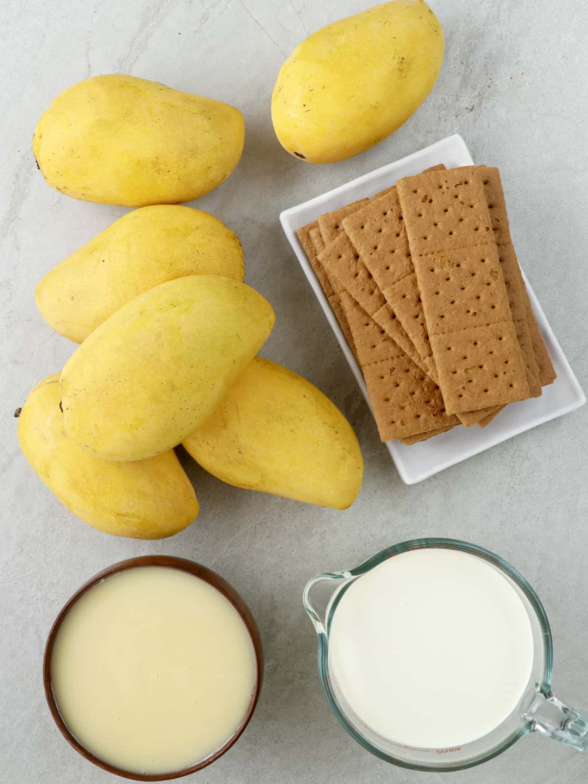 mangoes, condensed milk, heavy cream, graham crackers