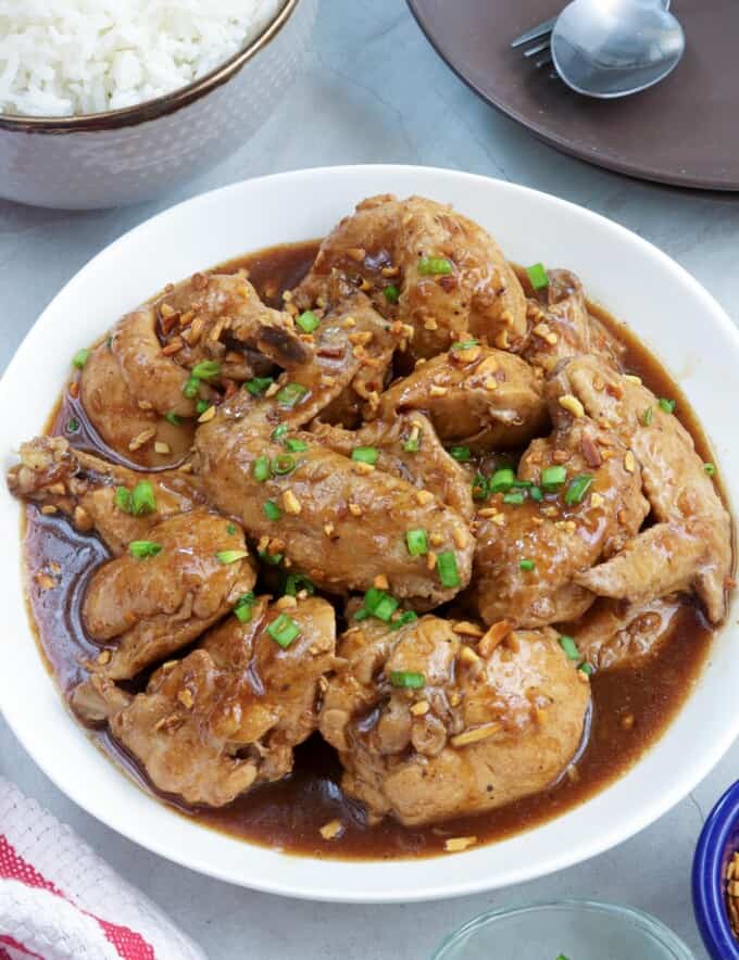 Chicken Adobo with Tamarind in a white serving bowl