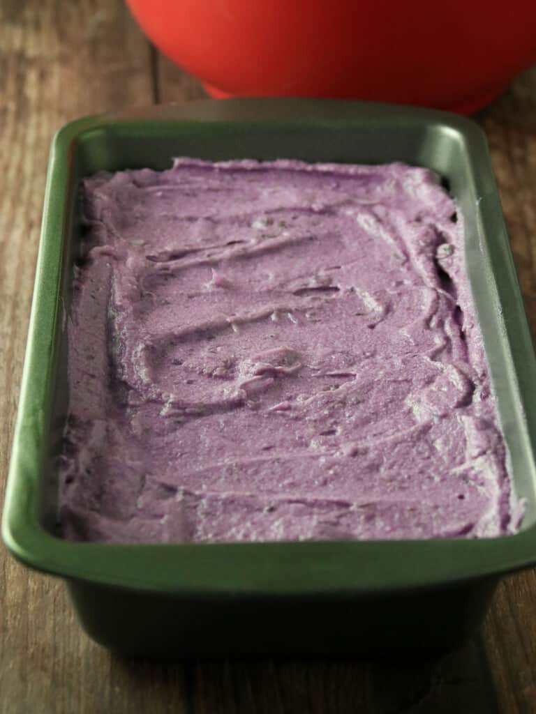 ube-flavored whipped cream in a metal tin
