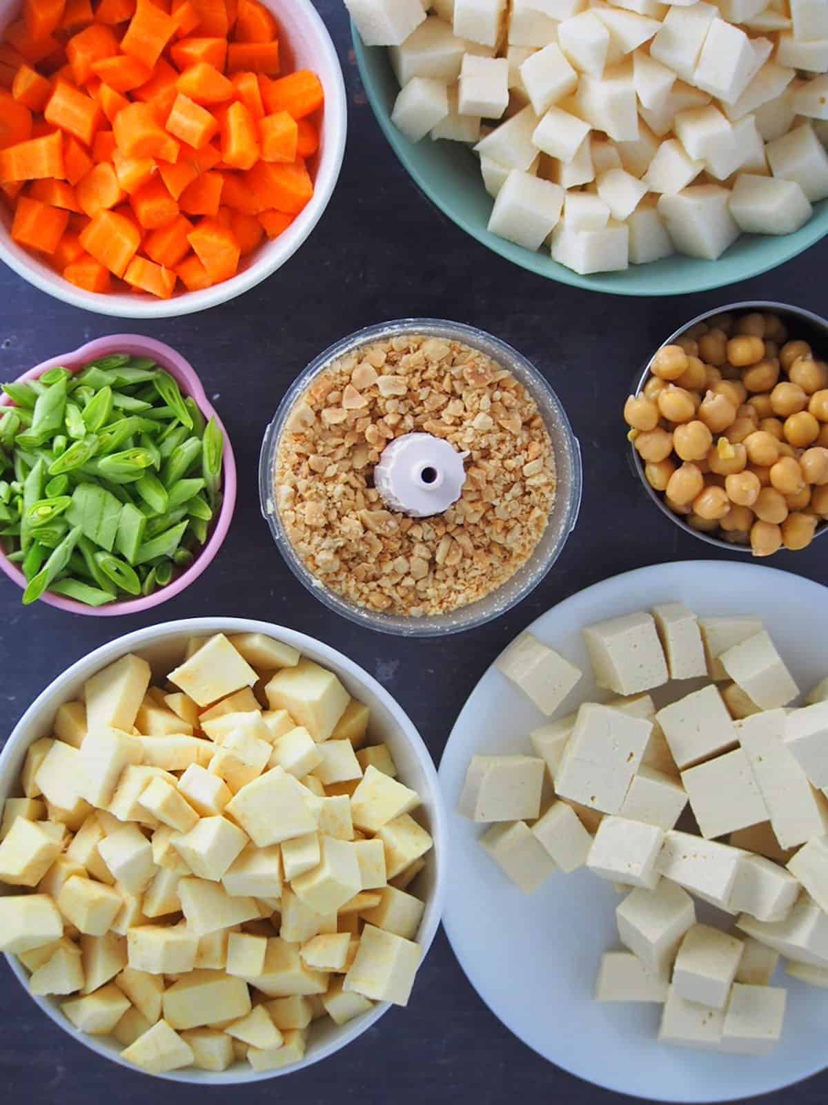 garbanzo beans, cubed carrots, singkamas, and firm tofu, sliced green beans, and ground peanuts