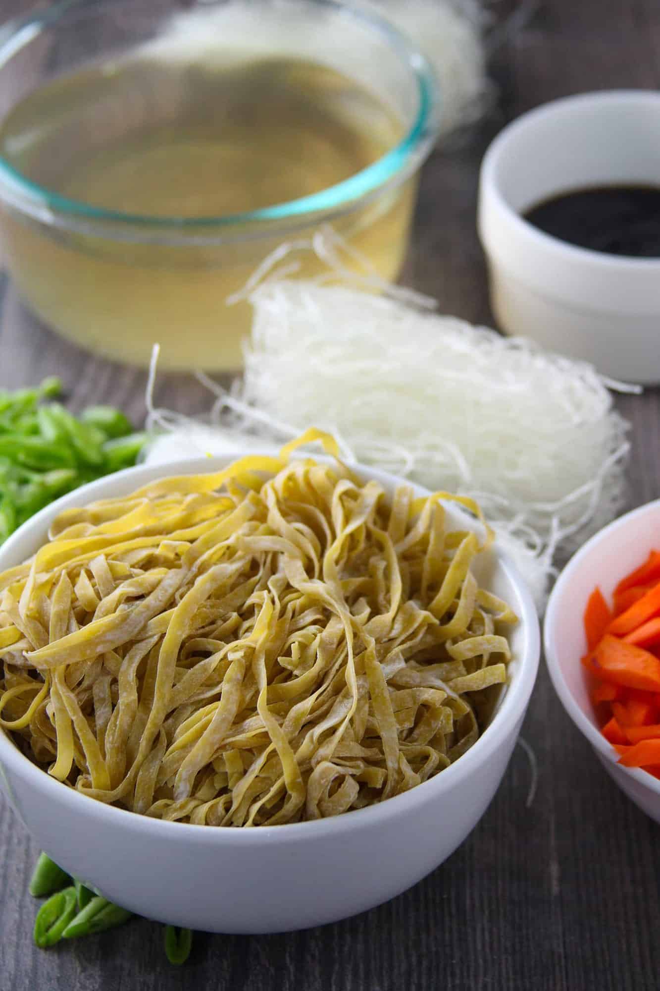 fresh egg noodles, sotanghon, julienned carrots, green beans, chicken broth, oyster sauce