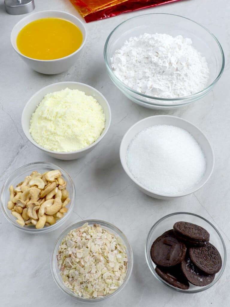 powdered full cream milk, oreo cookies, flour, cashes, pinipig, butter, sugar in bowls