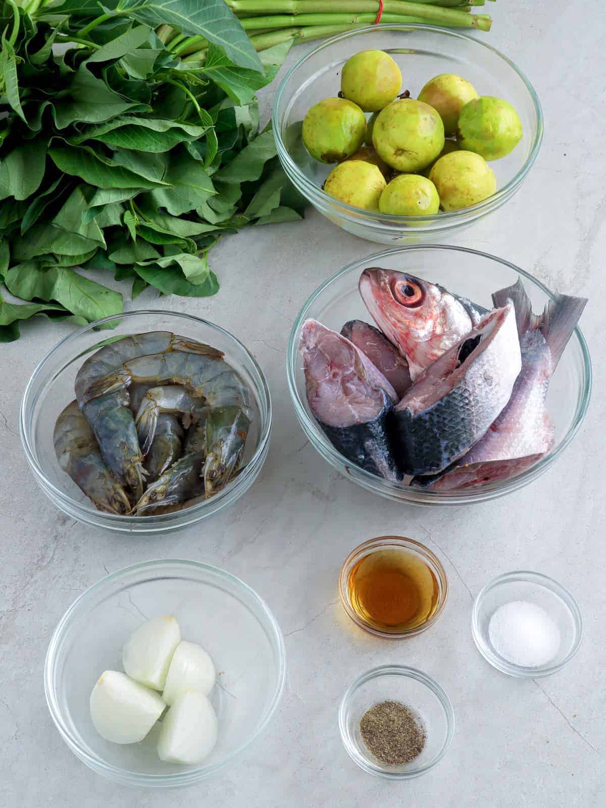 sliced bangus, shrimp, guavas, kangkong, onions, fish sauce, salt, pepper