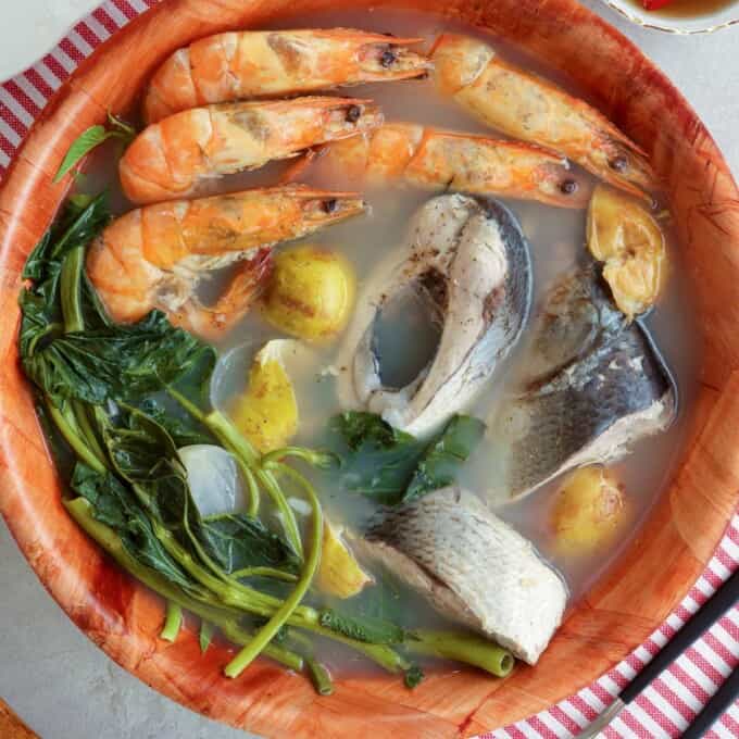 Bulanglang na Bangus at Hipon in a wooden serving bowl