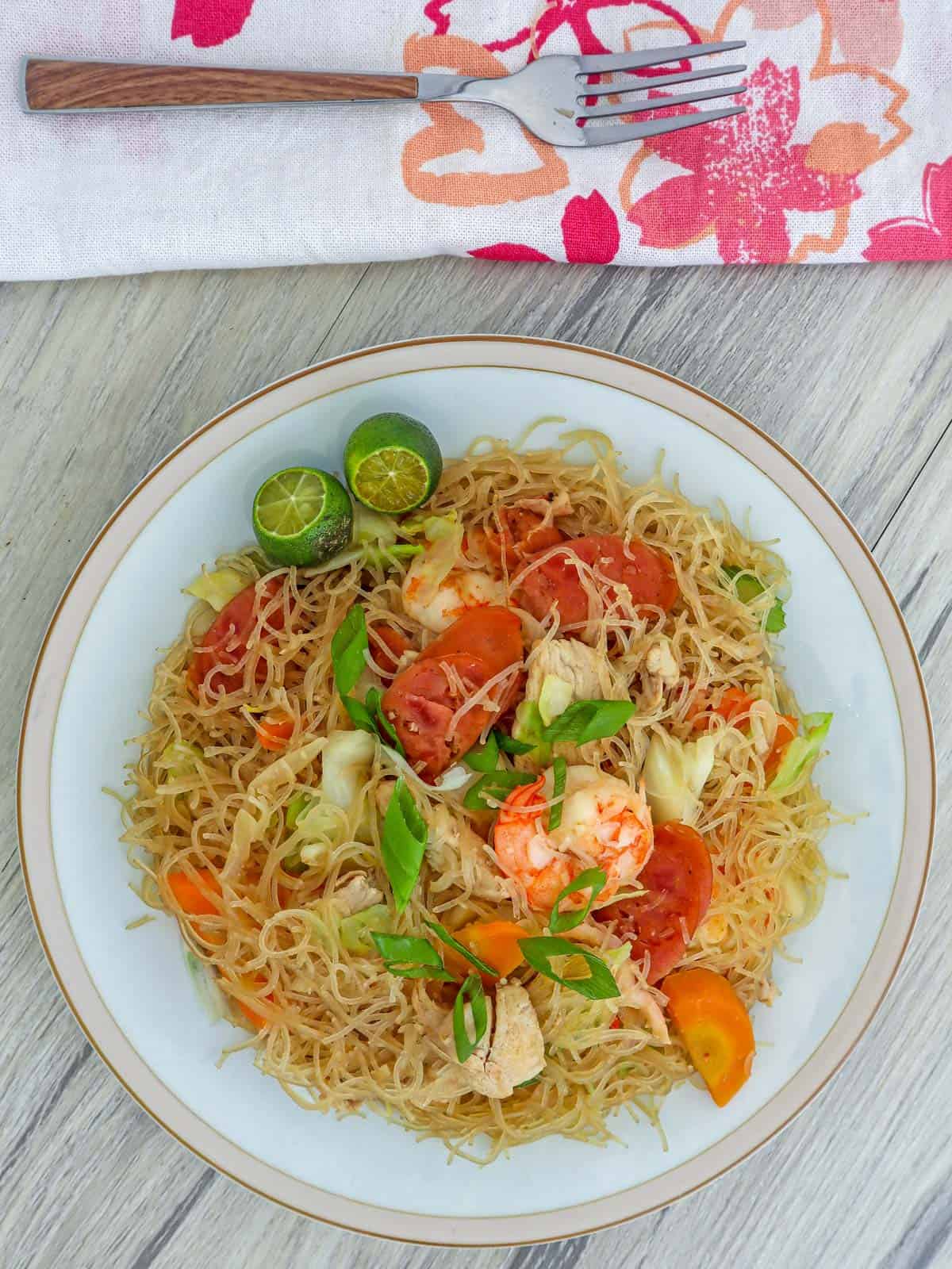 bihon guisado on a white serving plate