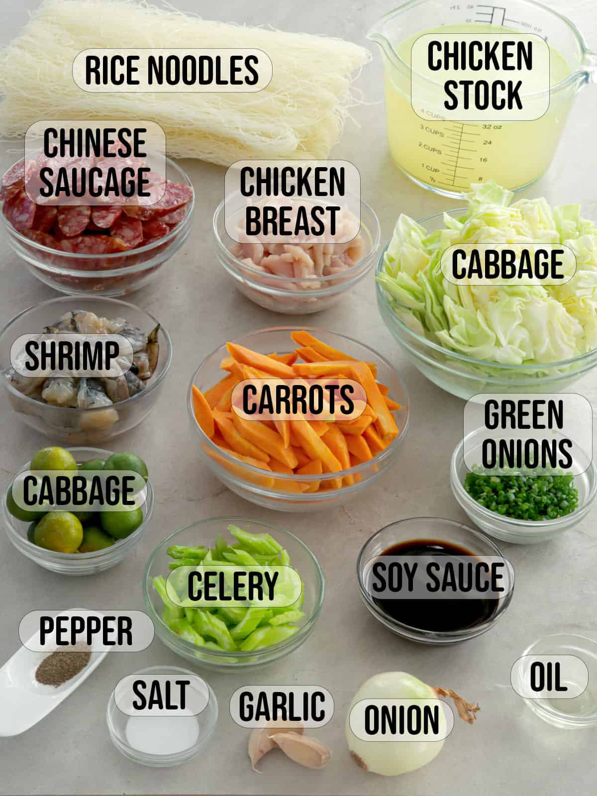 Pancit Bihon Guisado ingredients in bowls.