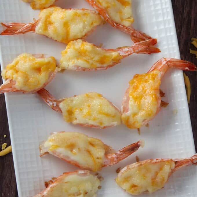 Baked Cheese Shrimp on a white serving platter
