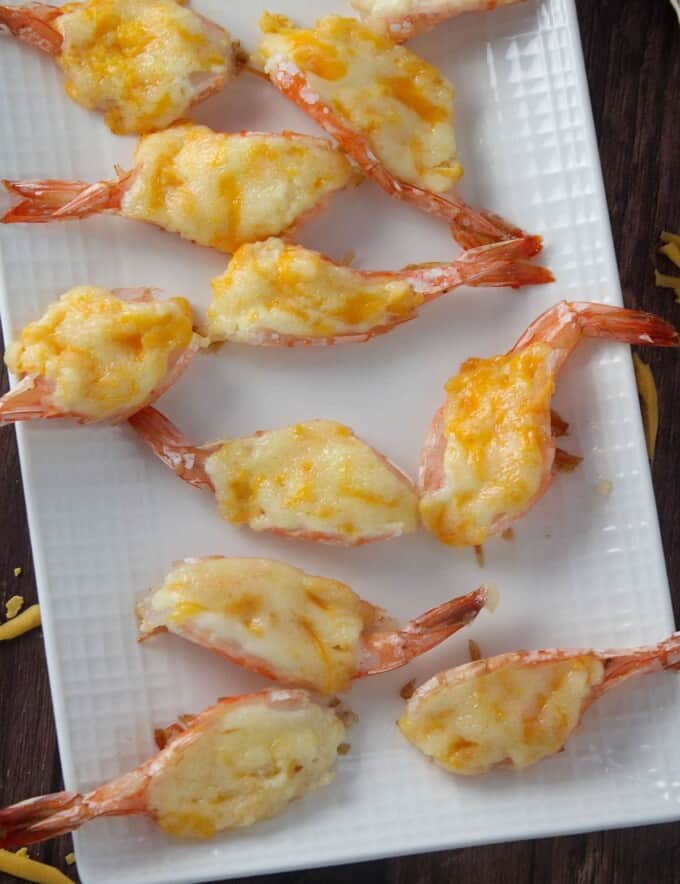 Baked Cheese Shrimp on a white serving platter